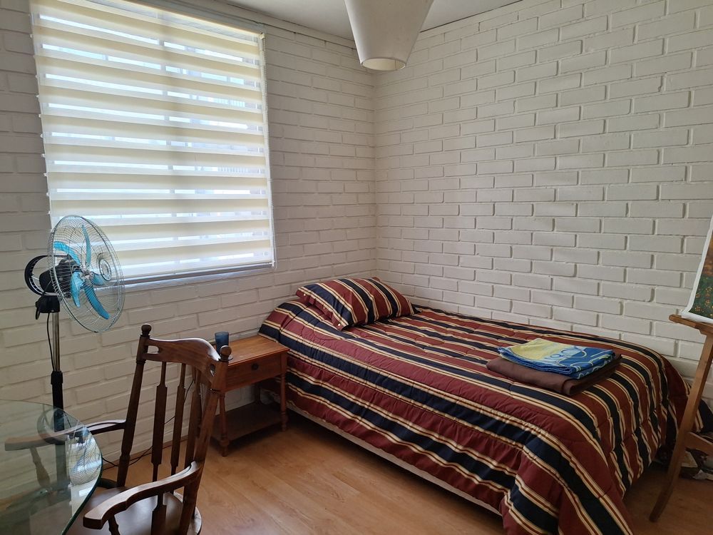 Amplia habitación en departamento tranquilo en Nunoa — Busco Roomie