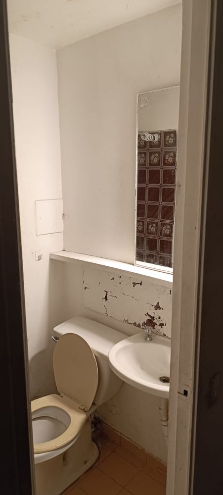 Habitacion pequeña con baño para estudiante en Nunoa